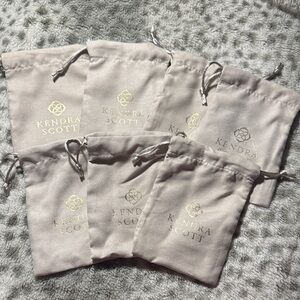 Kendra Scott Light Gray Pouches with Gold Logo